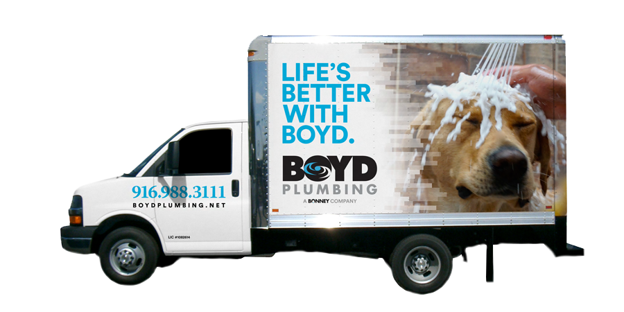 Boyd Truck with phone number (916.988.3111) on side of cab and "Life Better with Boyd" and dog being washed on side of trailer